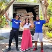 2 Lugg movers with a happy customer