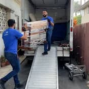 Box truck crew loading pickup