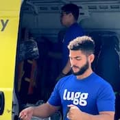 Lugger unloading van