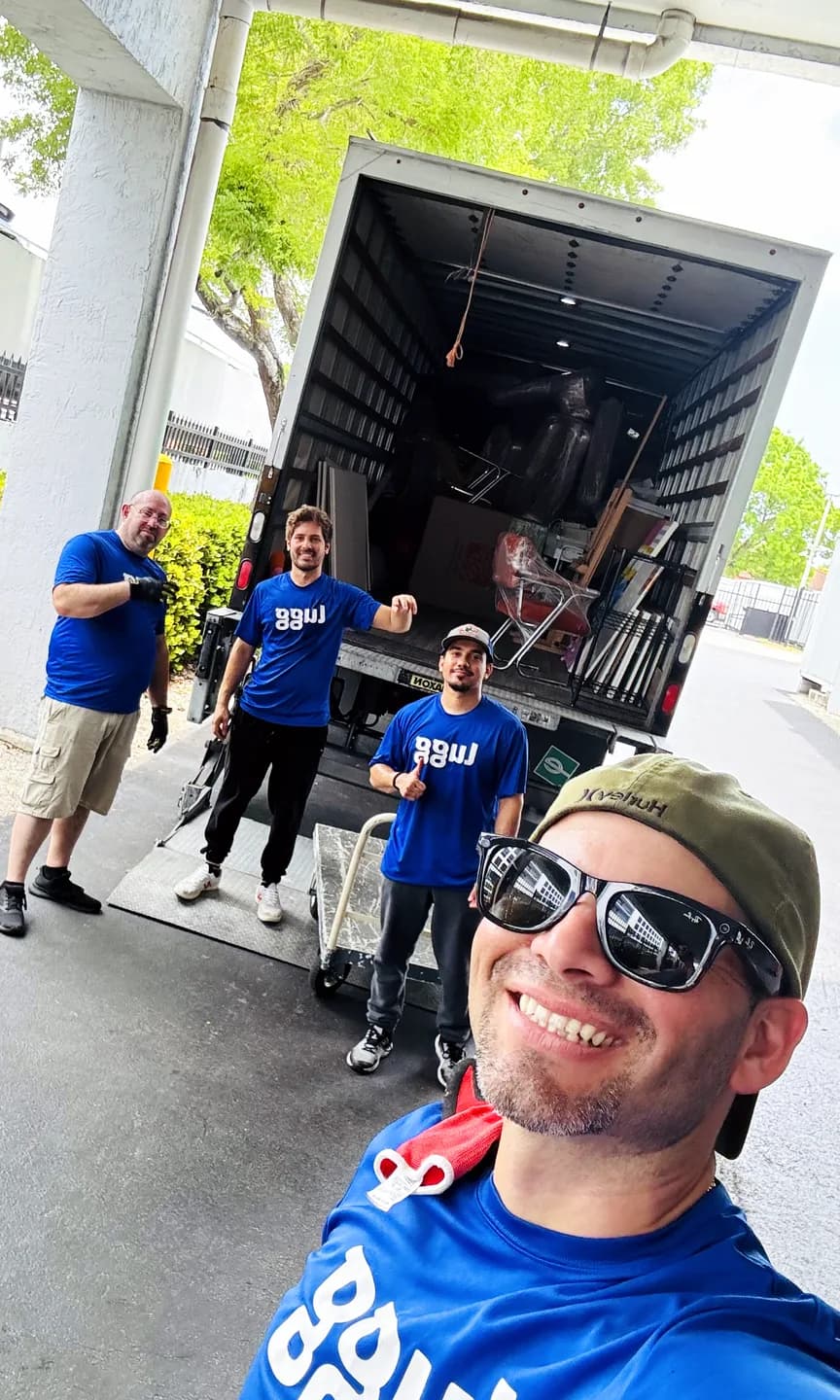 A crew of Luggers in front of a loaded truck