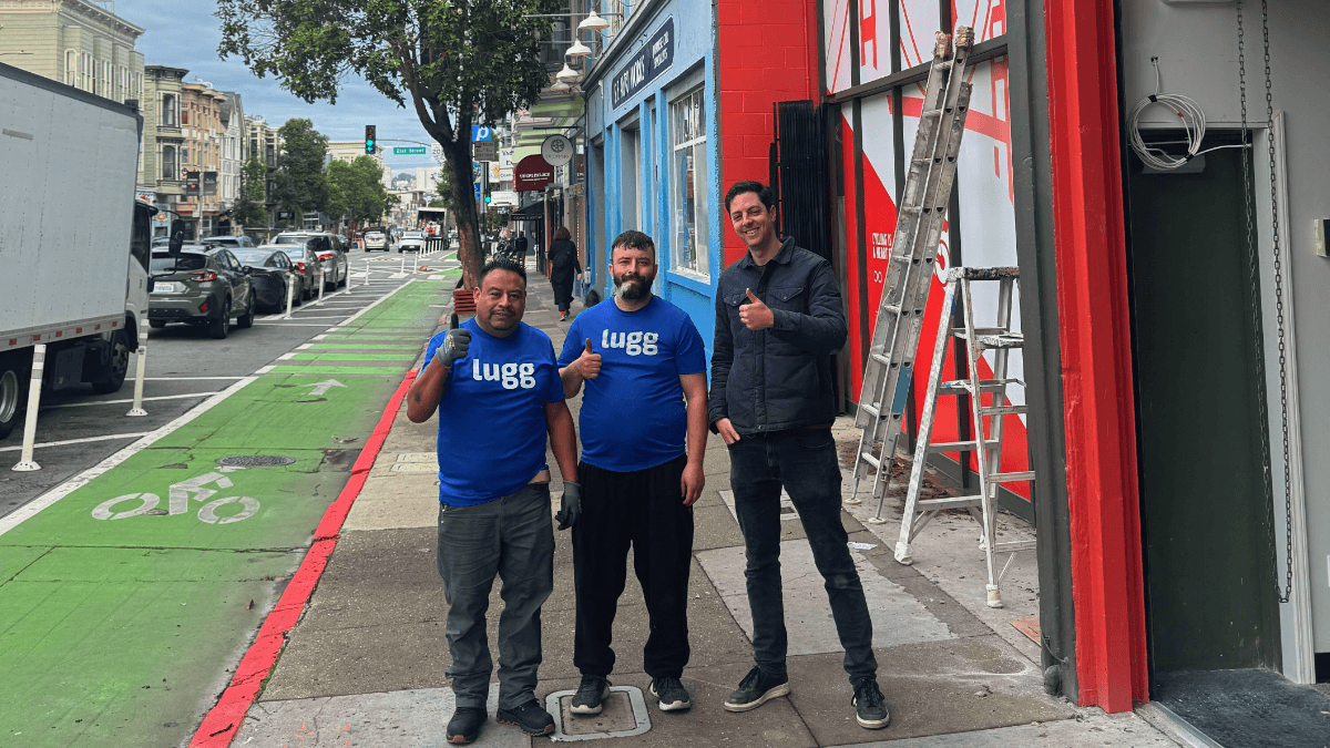 Lugg movers and The New Wheel founder Brett Thurber standing outside the new bike shop at 1031 Valencia Street, San Francisco